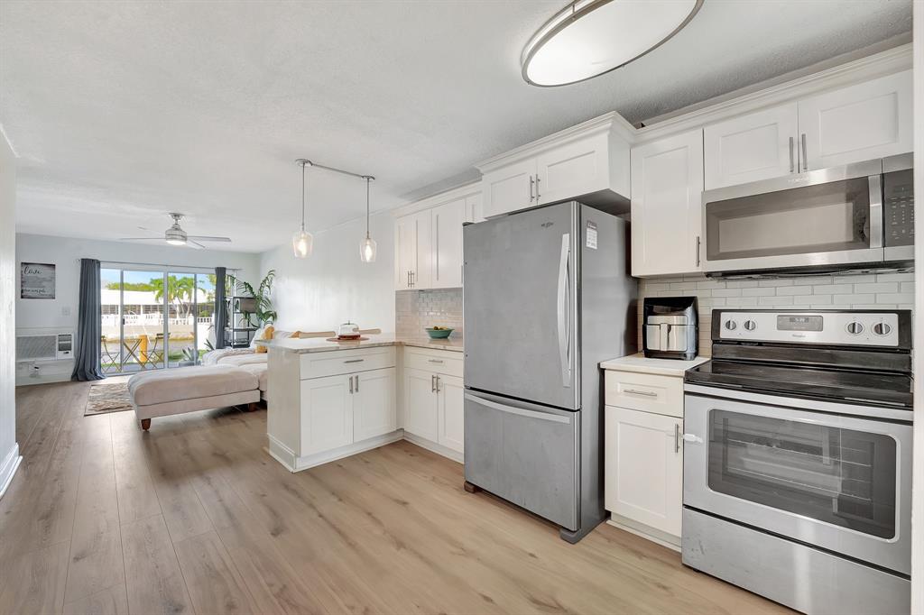 2311 Northeast 36th Street, Unit 1F Lighthouse Point, FL 33064 - Photo 16 of 35 Water views from kitchen