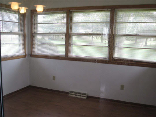 6891 Tipple Road Rockford, IL 61102 - Photo 4 of 6 an empty room with a window