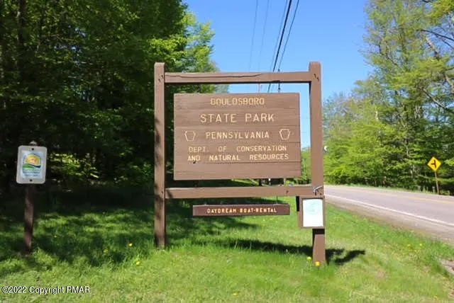 a sign on the side of the road