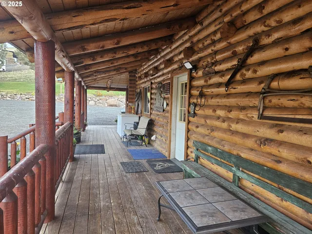 a kitchen with stainless steel appliances granite countertop a stove and cabinets