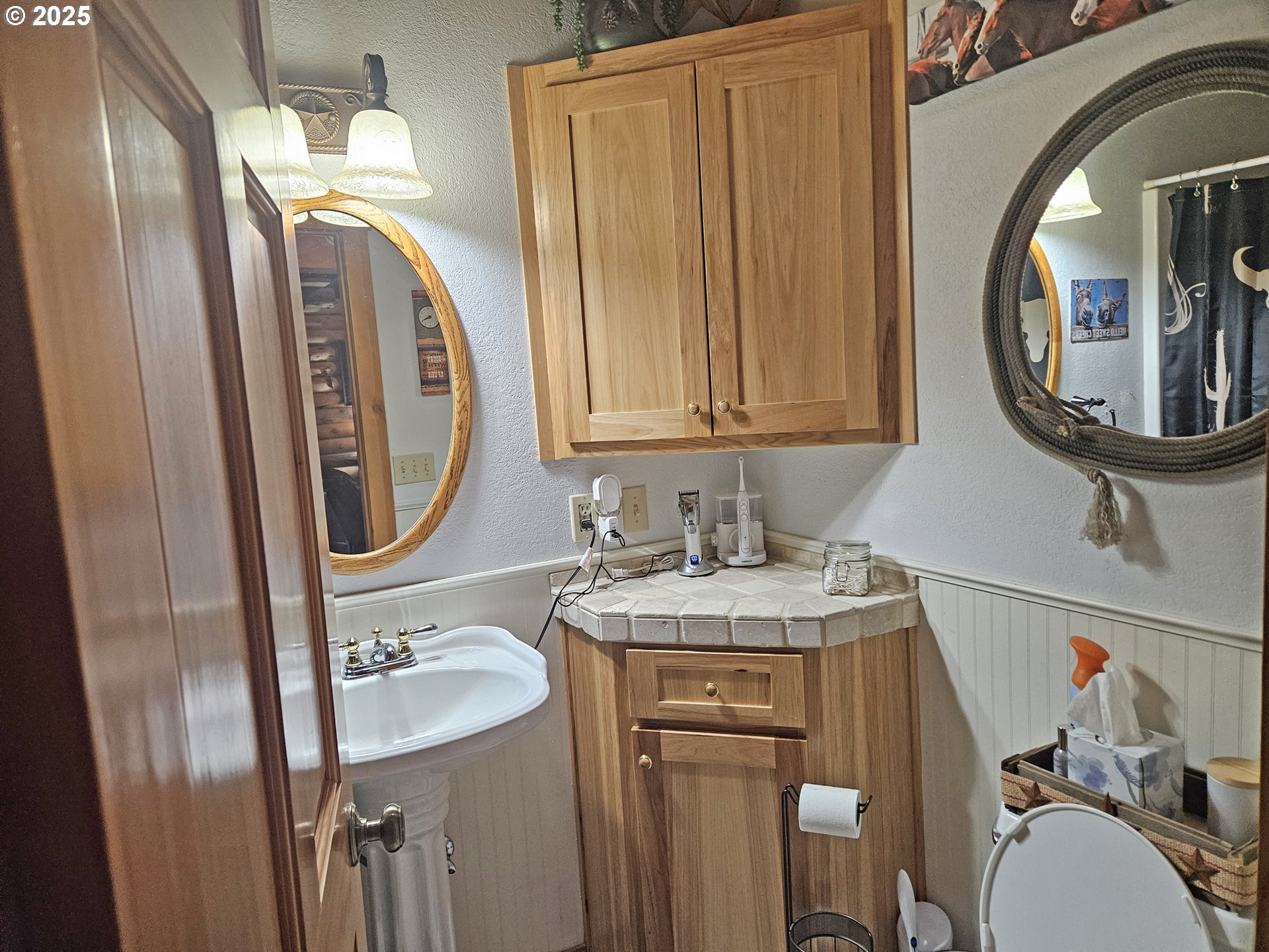 46457 Highway 218 Fossil, OR 97830 - Photo 40 of 45 a bathroom with a sink and a mirror