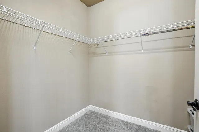 a view of a room with racks on the wall