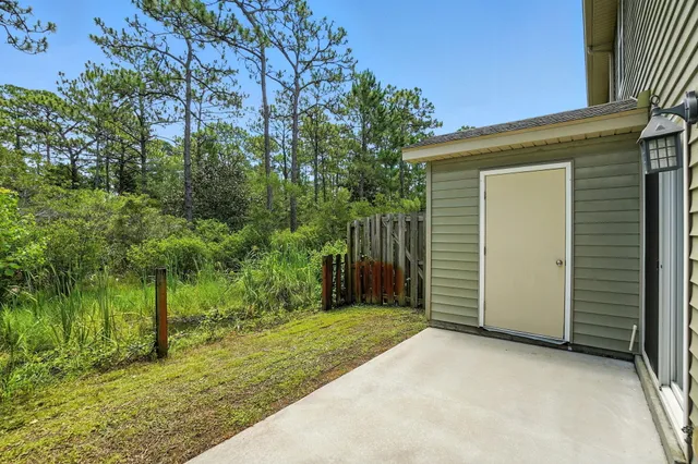 a view of a backyard of the house