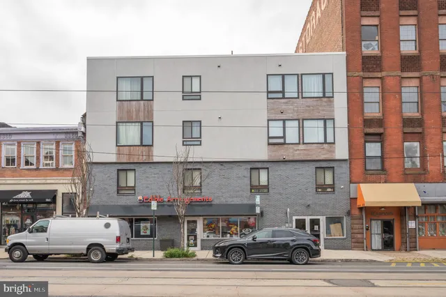 a car parked in front of a building