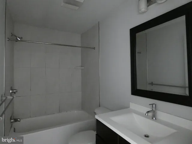 a bathroom with a sink and a bathtub