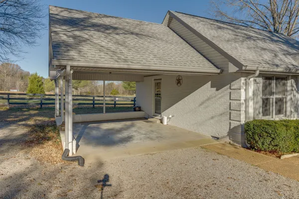 a view of a entrance gate of the house