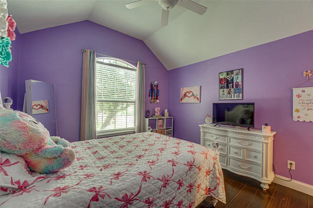 5218 Griffins Pointe Drive Rowlett, TX 75089 - Photo 29 of 40 Other view of secondary bedroom on second level.