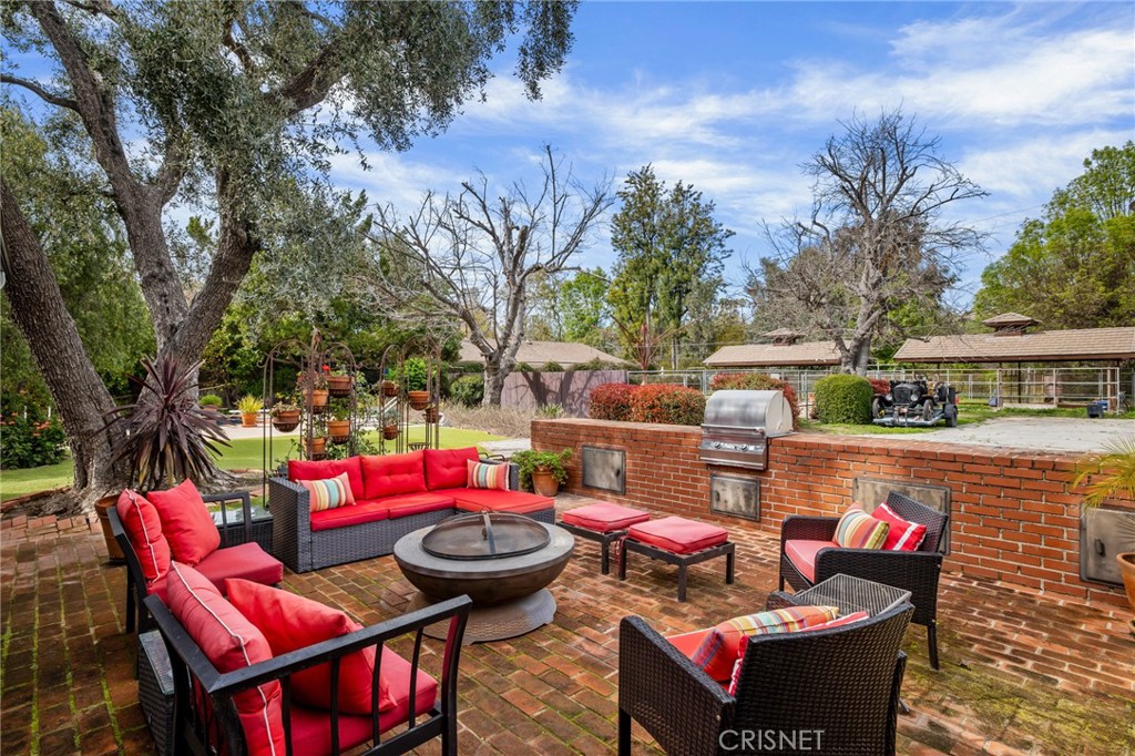 23629 Long Valley Road Hidden Hills, CA 91302 - Photo 18 of 26 a outdoor space with patio furniture
