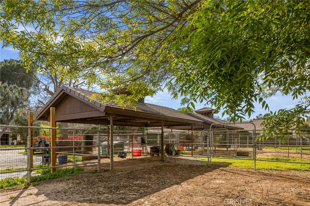 23629 Long Valley Road Hidden Hills, CA 91302 - Photo 20 of 26 a view of a house with garden