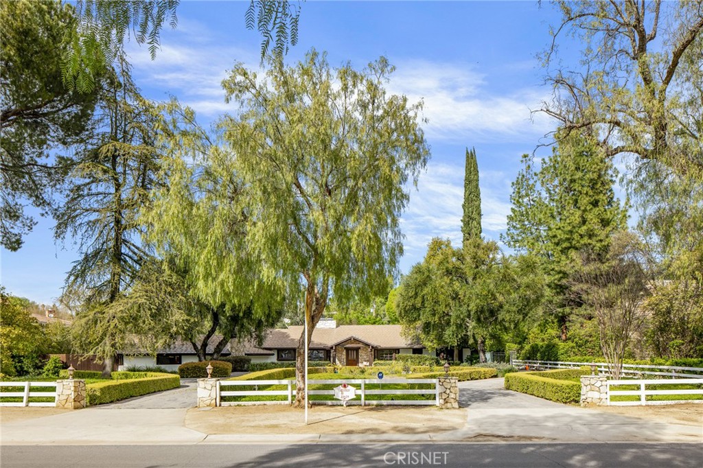 23629 Long Valley Road Hidden Hills, CA 91302 - Photo 23 of 26 a view of a yard with plants and trees