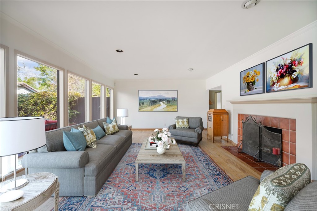 23629 Long Valley Road Hidden Hills, CA 91302 - Photo 4 of 26 a living room with furniture fireplace and window