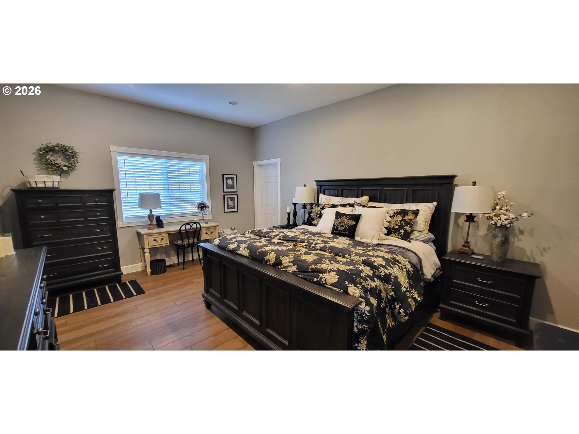 113 Southeast 3rd Avenue Milton Freewater, OR 97862 - Photo 11 of 38 a bedroom with a bed and wooden floor