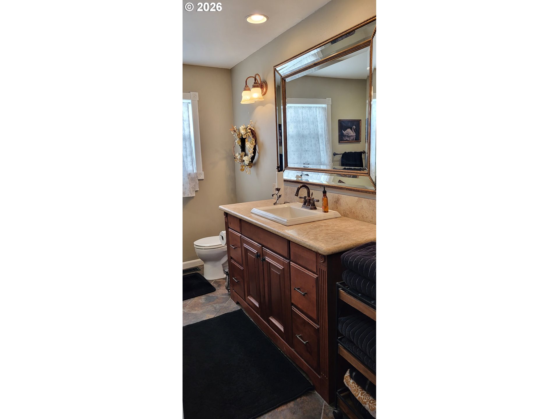 113 Southeast 3rd Avenue Milton Freewater, OR 97862 - Photo 20 of 38 a bathroom with a sink and a mirror