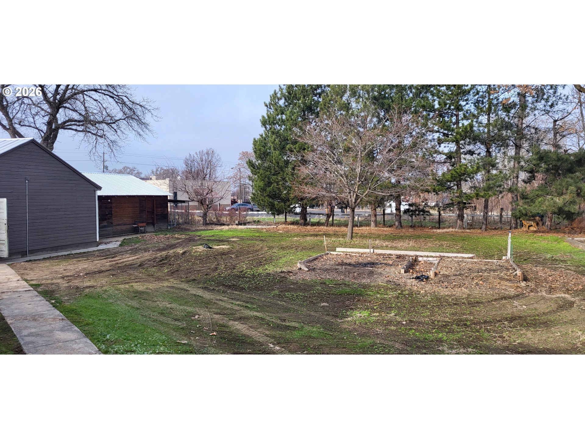 113 Southeast 3rd Avenue Milton Freewater, OR 97862 - Photo 36 of 38 a view of a swimming pool with an outdoor space and seating area