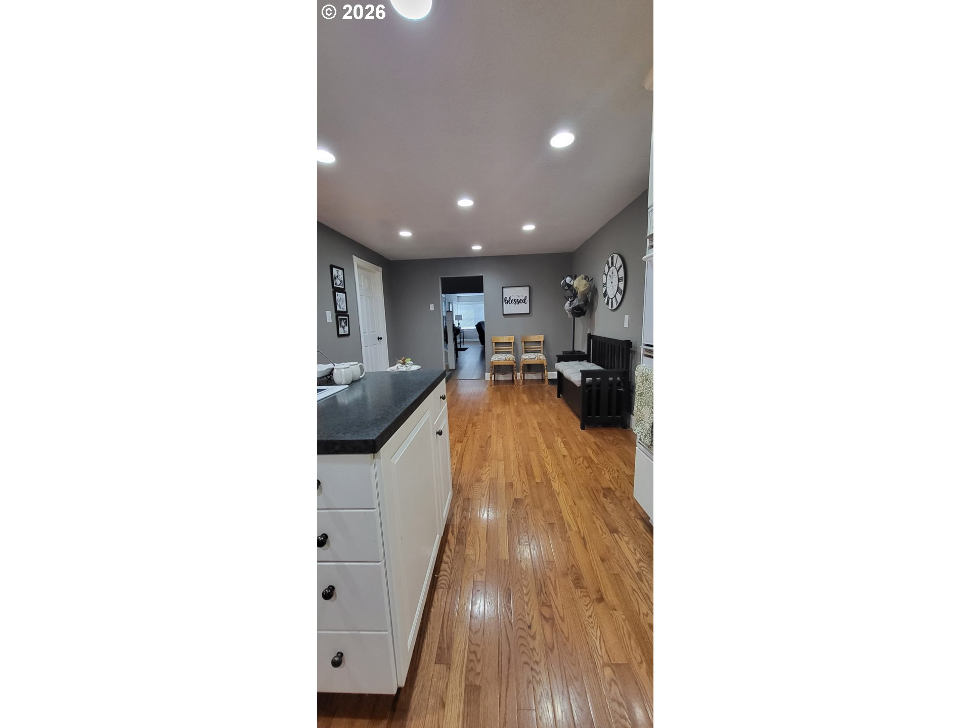 113 Southeast 3rd Avenue Milton Freewater, OR 97862 - Photo 8 of 38 a view of a living room with furniture and wooden floor