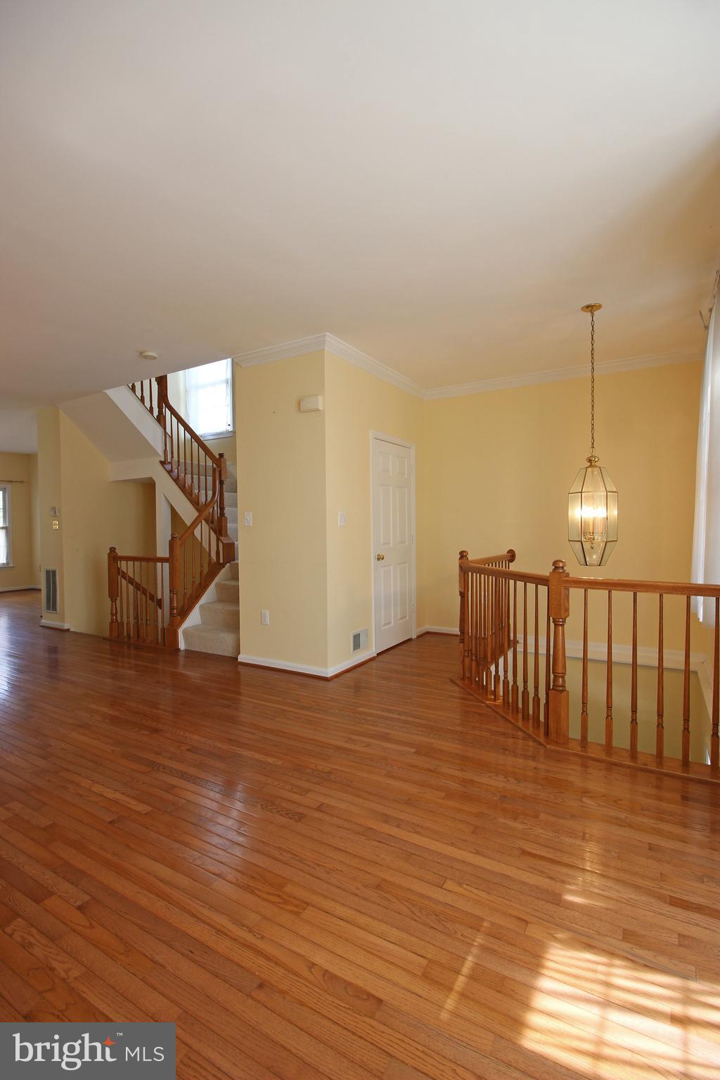 11799 Valley Ridge Circle Fairfax, VA 22033 - Photo 21 of 43 a view of empty room with wooden floor