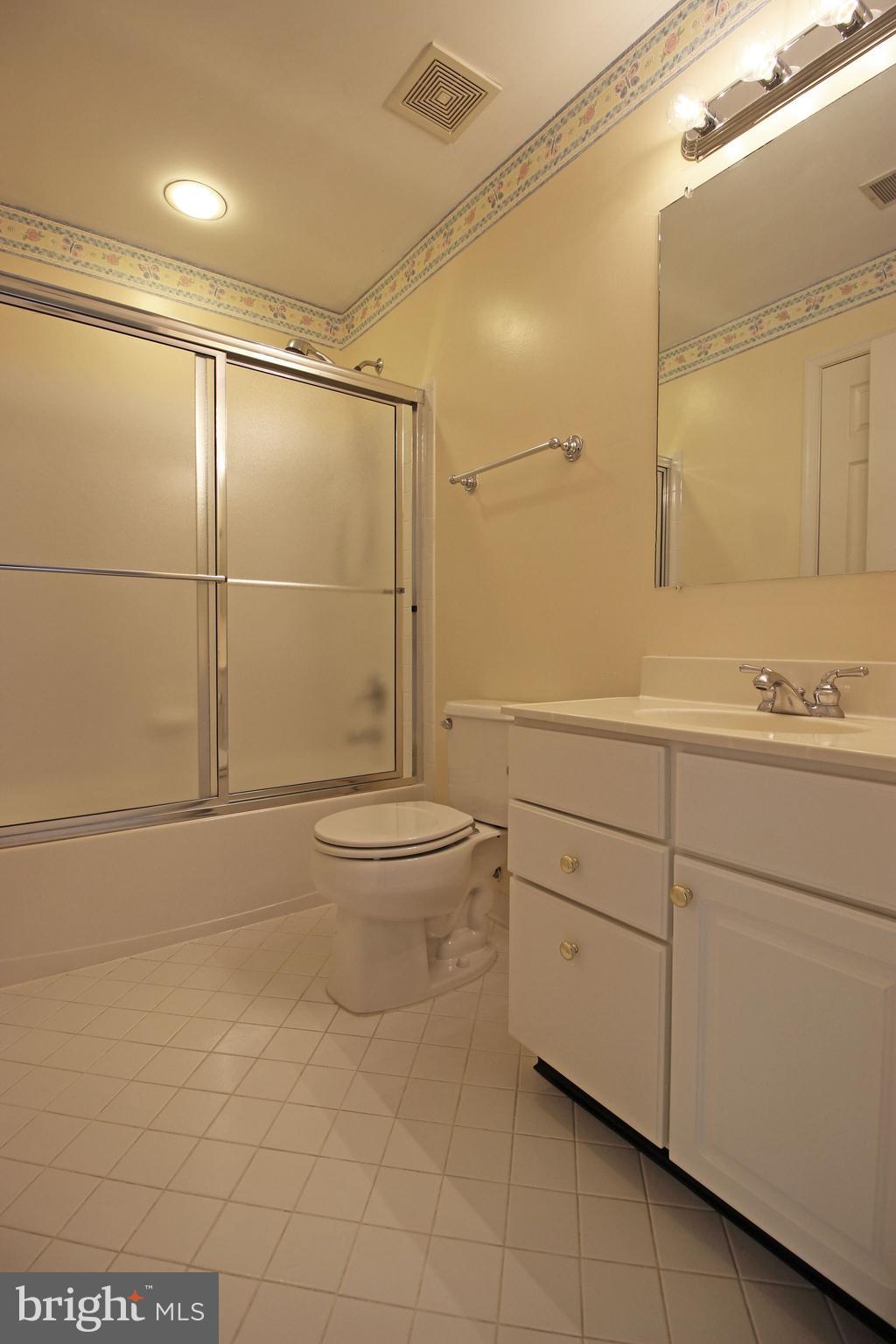 11799 Valley Ridge Circle Fairfax, VA 22033 - Photo 26 of 43 a bathroom with a toilet sink and shower