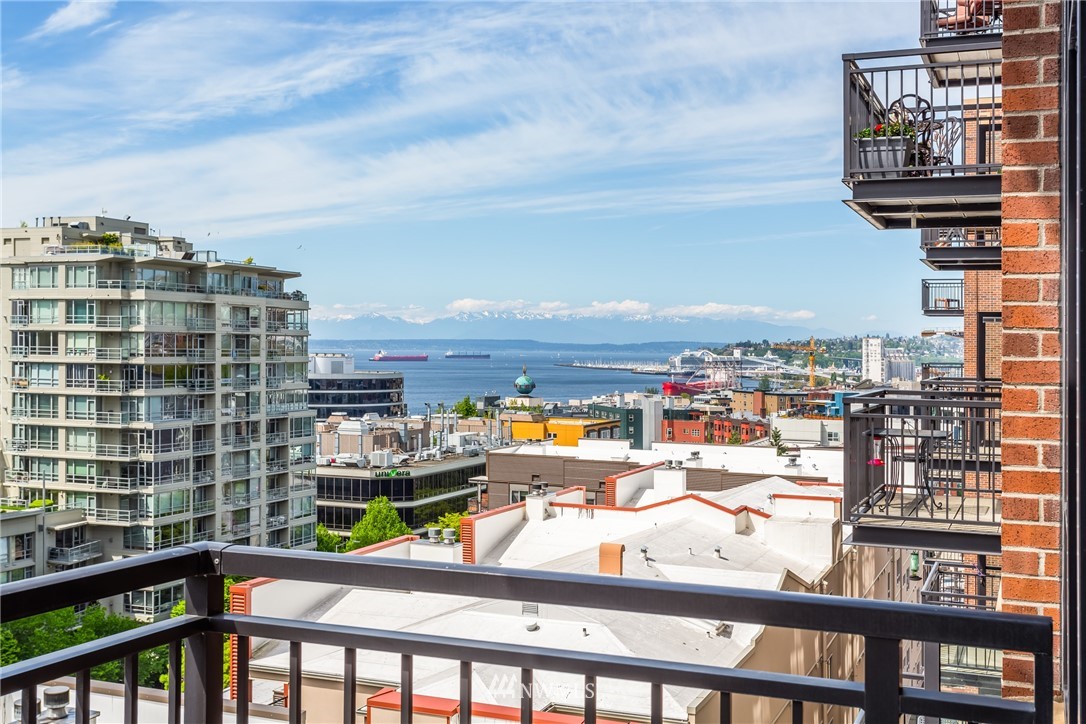 2911 2nd Avenue, Unit 903 Seattle, WA 98121 - Photo 4 of 25 a view of a city from a balcony
