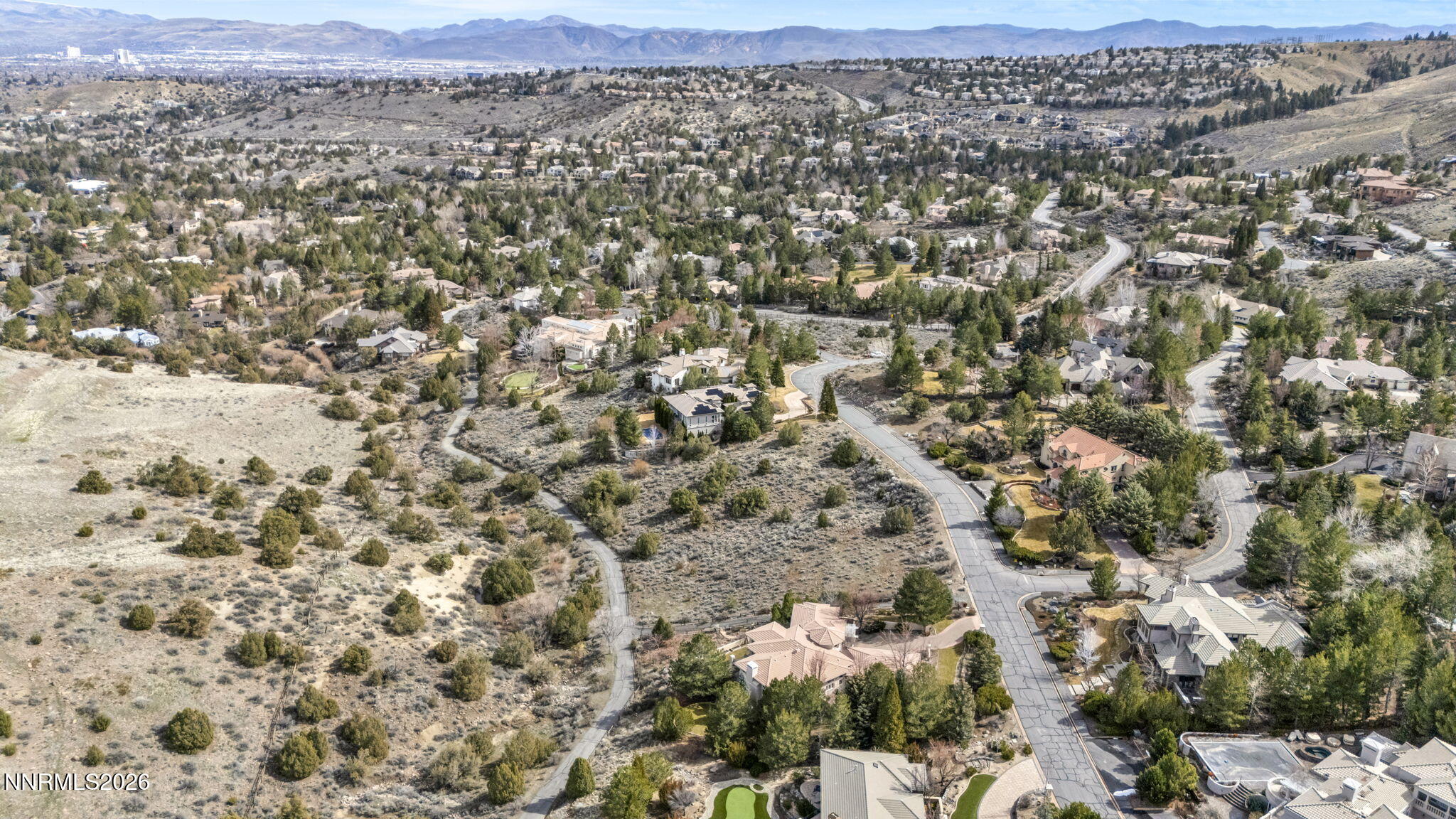4387 Sharps Road Reno, NV 89519 - Photo 10 of 12 an aerial view of residential houses with outdoor space
