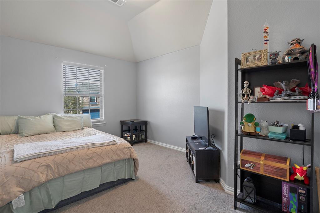 4002 Magnolia Ridge Drive Melissa, TX 75454 - Photo 24 of 36 a bedroom with a bed and a window
