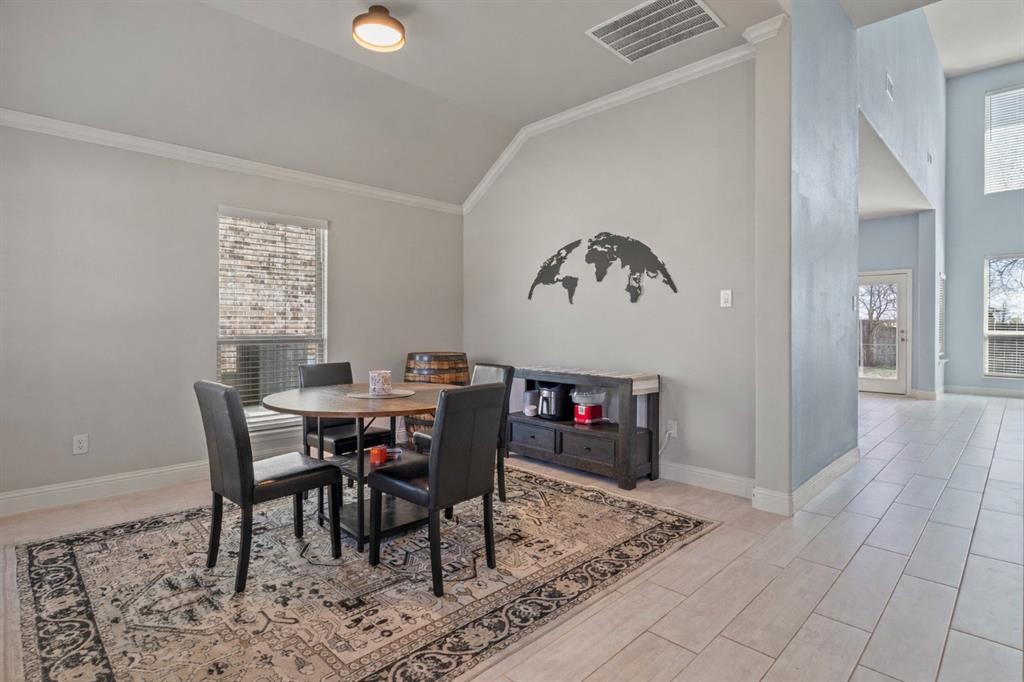 4002 Magnolia Ridge Drive Melissa, TX 75454 - Photo 10 of 36 a view of a dining room with furniture