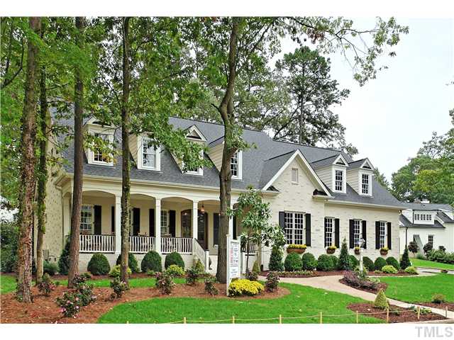 1500 Brooks Avenue Raleigh, NC 27607 - Photo 1 of 25 a front view of a house with a yard