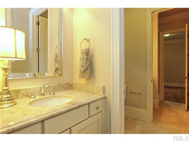 1500 Brooks Avenue Raleigh, NC 27607 - Photo 13 of 25 a bathroom with a granite countertop sink and a mirror
