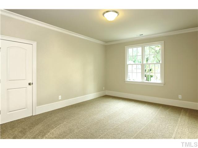 1500 Brooks Avenue Raleigh, NC 27607 - Photo 24 of 25 a view of an empty room with a window and wooden floor