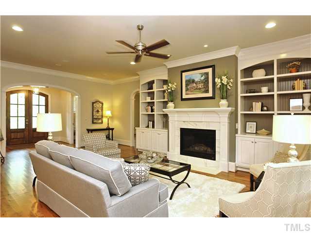 1500 Brooks Avenue Raleigh, NC 27607 - Photo 4 of 25 a living room with furniture and a fireplace