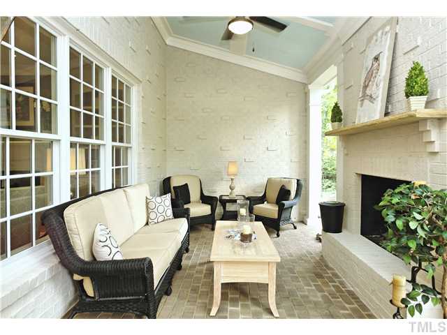 1500 Brooks Avenue Raleigh, NC 27607 - Photo 6 of 25 a living room with furniture and a fireplace