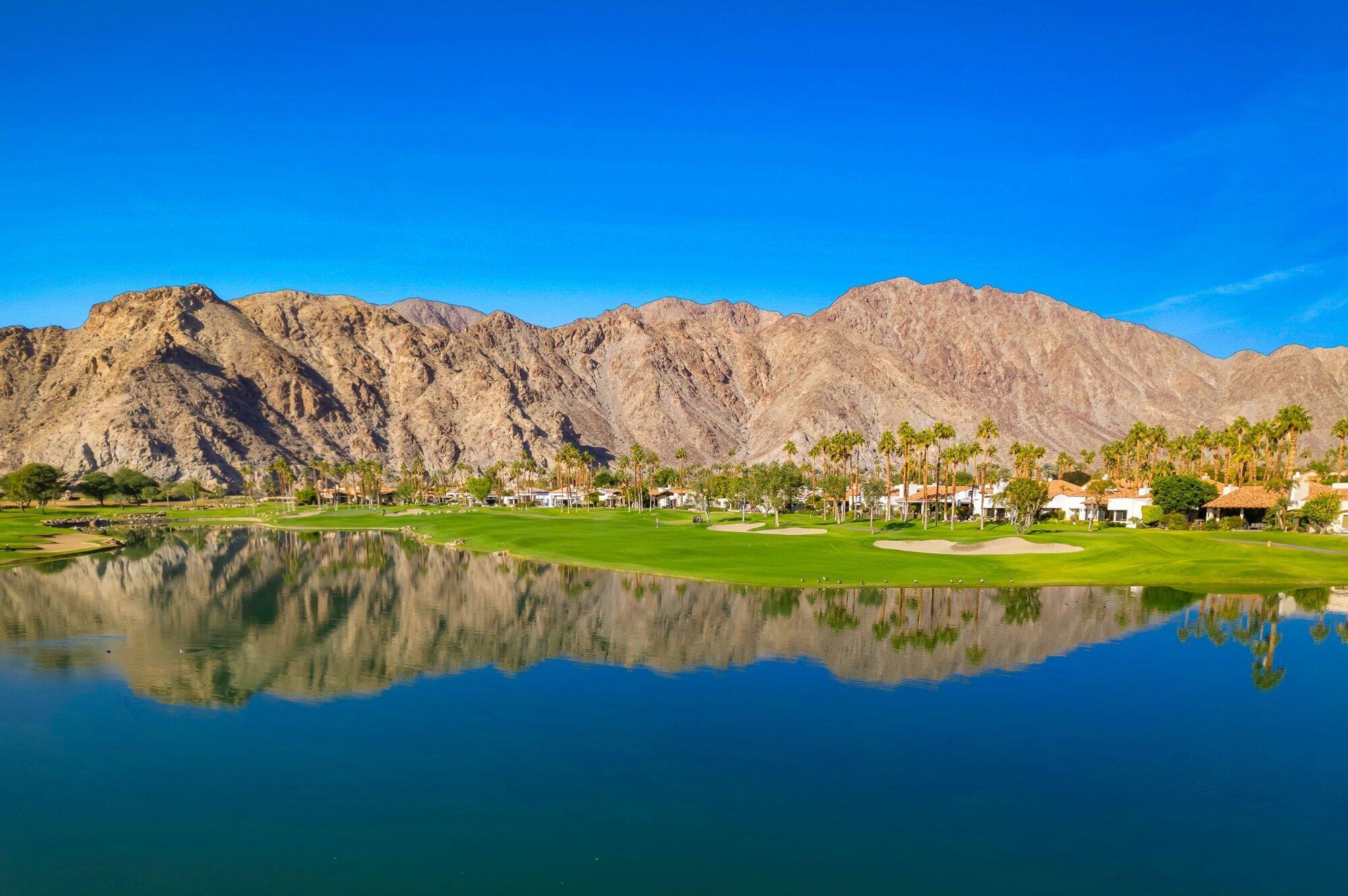 55880 Pinehurst La Quinta, CA 92253 - Photo 12 of 54 a view of a lake with a mountain in the background