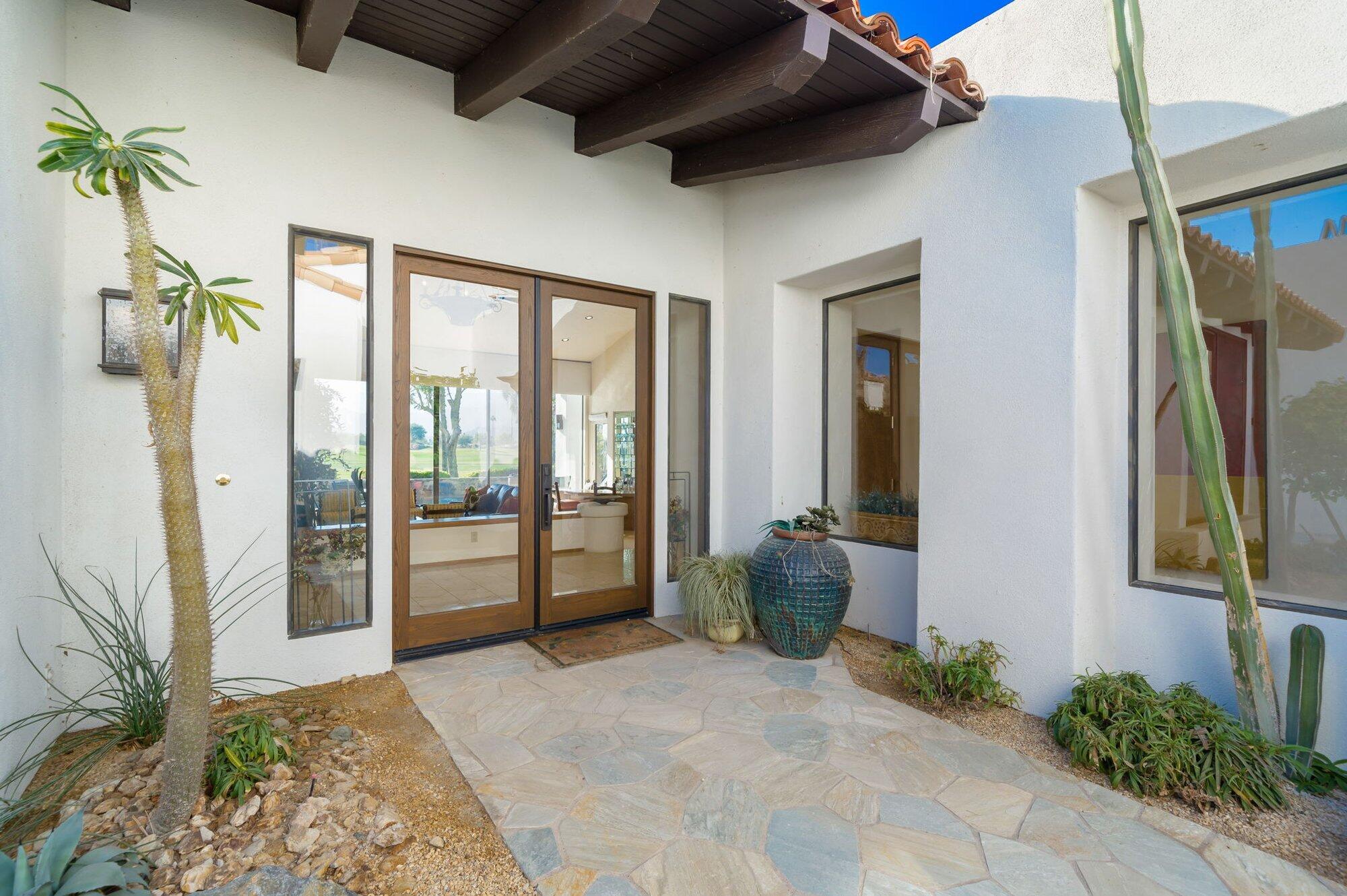 55880 Pinehurst La Quinta, CA 92253 - Photo 15 of 54 a view of an entryway