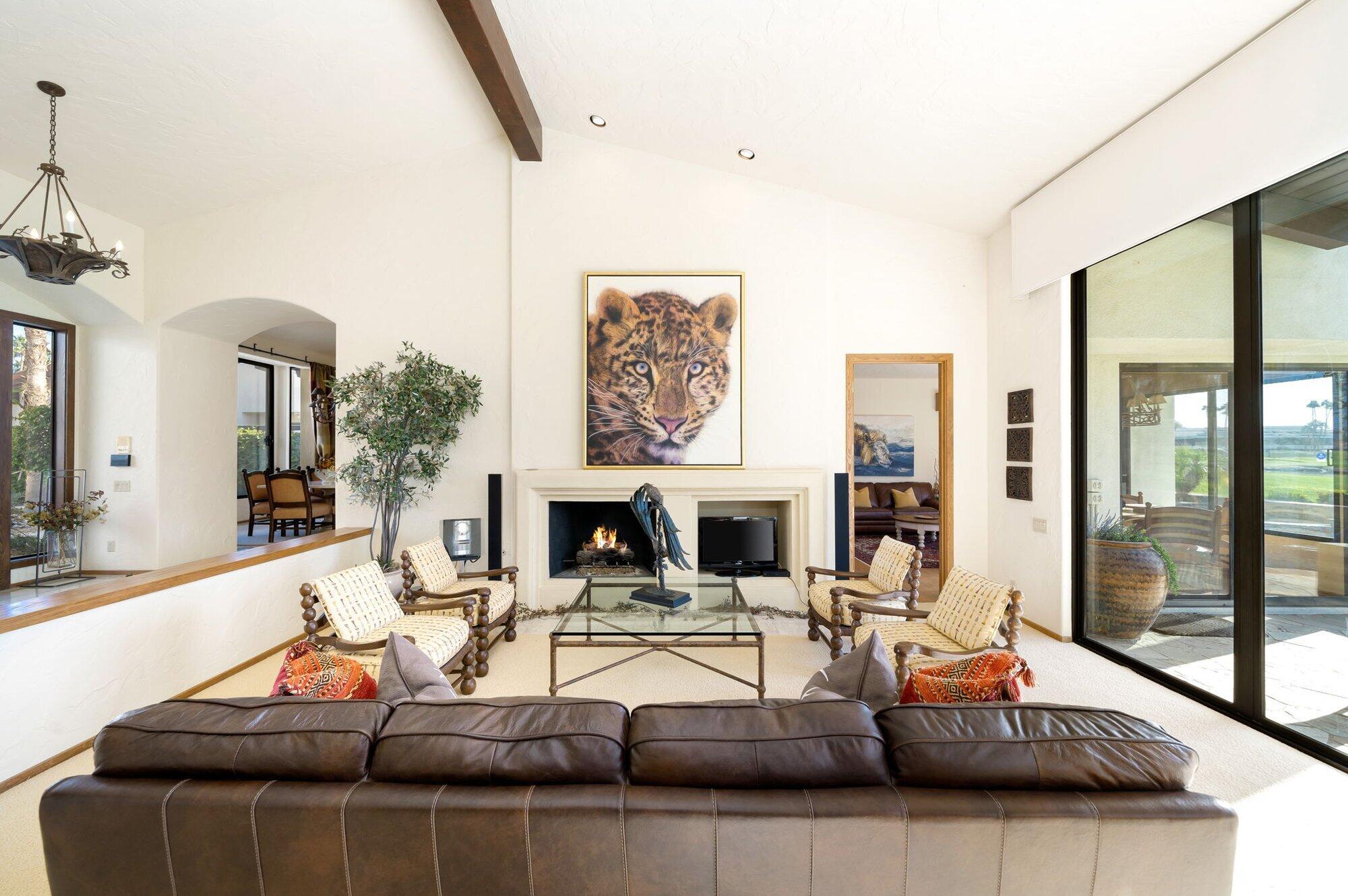 55880 Pinehurst La Quinta, CA 92253 - Photo 19 of 54 a living room with furniture fireplace and a large window