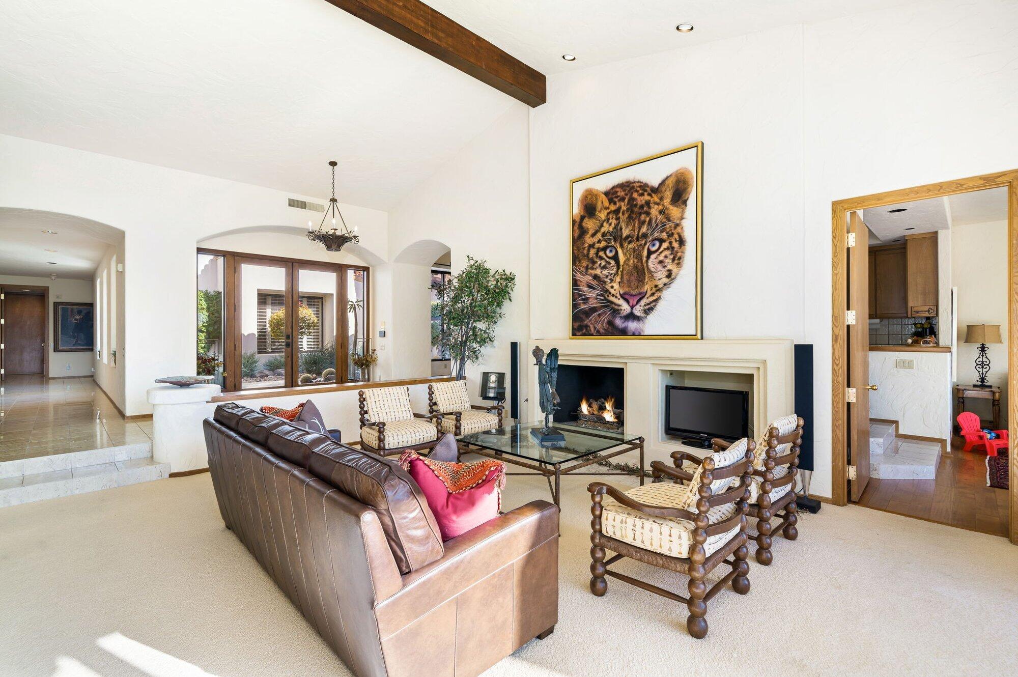 55880 Pinehurst La Quinta, CA 92253 - Photo 20 of 54 a living room with furniture and a fireplace