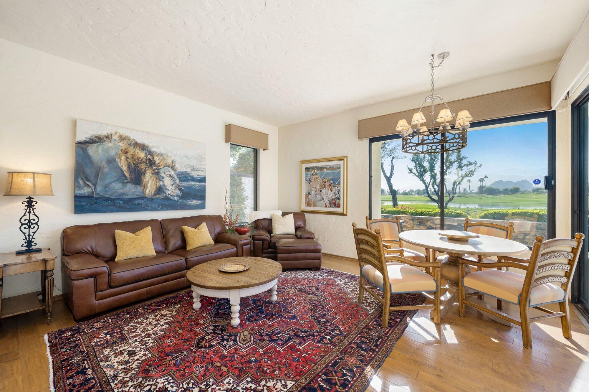 55880 Pinehurst La Quinta, CA 92253 - Photo 30 of 54 a living room with furniture and a large window