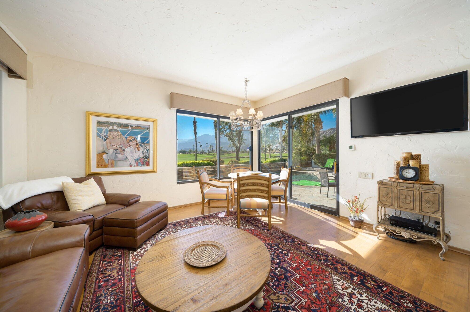 55880 Pinehurst La Quinta, CA 92253 - Photo 31 of 54 a living room with furniture and a flat screen tv