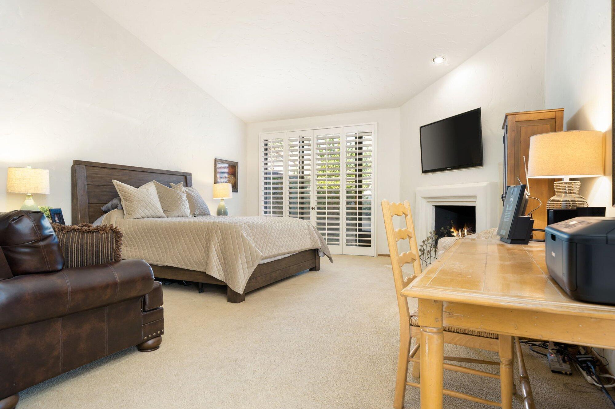 55880 Pinehurst La Quinta, CA 92253 - Photo 38 of 54 a bedroom with a bed and a flat screen tv