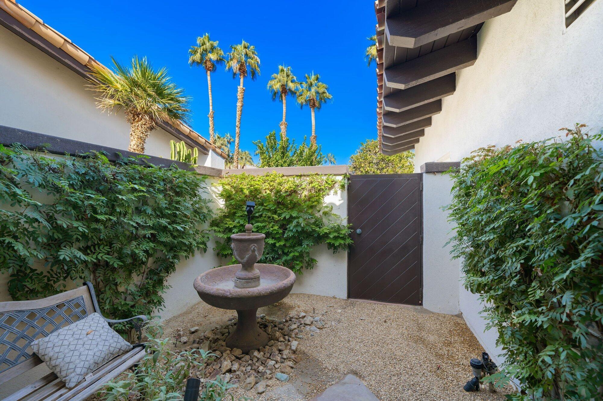 55880 Pinehurst La Quinta, CA 92253 - Photo 48 of 54 a view of a backyard with potted plants