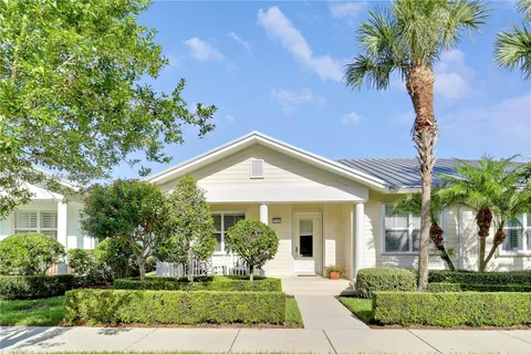 a view of a city with a lake