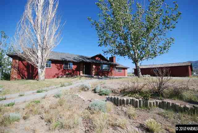 10505 Wells Fargo Road Reno, NV 89508 - Photo 1 of 9 a view of a house with a yard