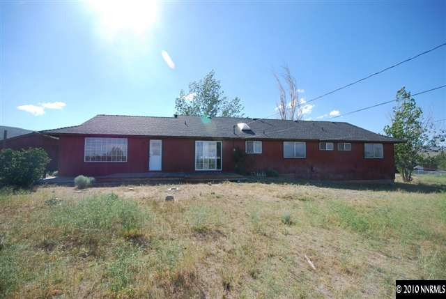10505 Wells Fargo Road Reno, NV 89508 - Photo 9 of 9 a view of a house with a yard