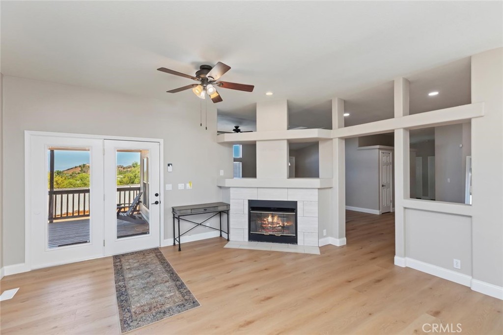 19310 Ann Way Perris, CA 92570 - Photo 20 of 75 a living room with furniture and a fireplace