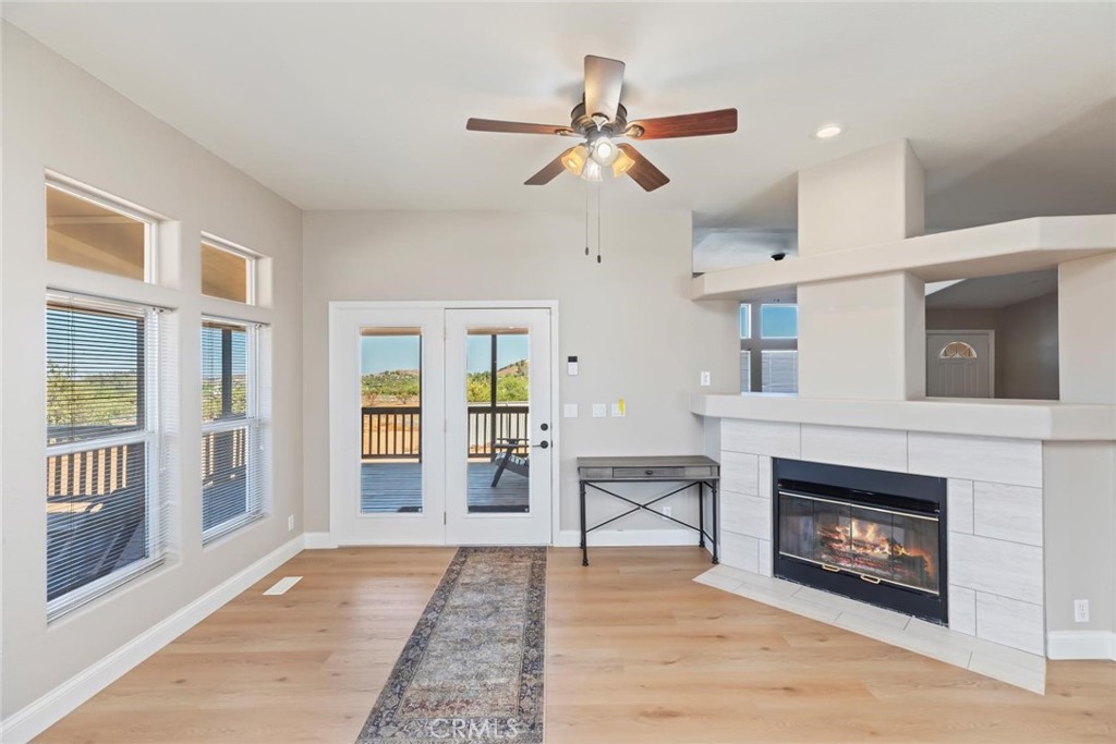 19310 Ann Way Perris, CA 92570 - Photo 22 of 75 a living room with furniture and a fireplace