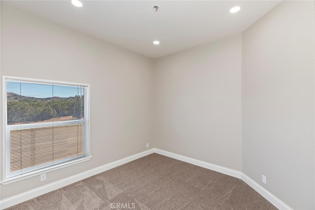 19310 Ann Way Perris, CA 92570 - Photo 37 of 75 a view of an empty room with a window