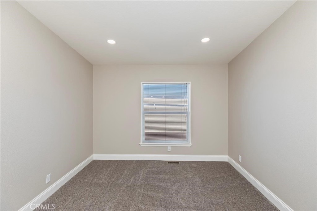19310 Ann Way Perris, CA 92570 - Photo 38 of 75 a view of an empty room with a window