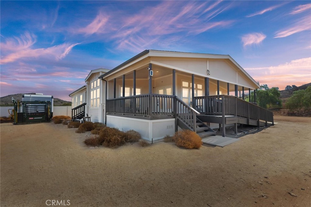 19310 Ann Way Perris, CA 92570 - Photo 43 of 75 a view of a house with a wooden fence