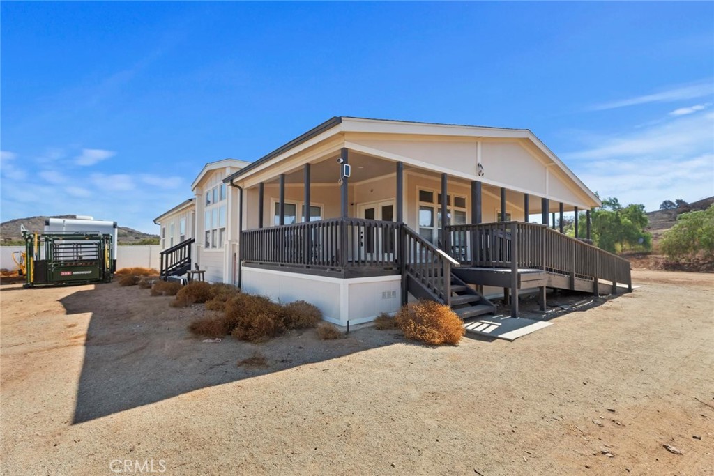 19310 Ann Way Perris, CA 92570 - Photo 46 of 75 a view of a house with a wooden fence