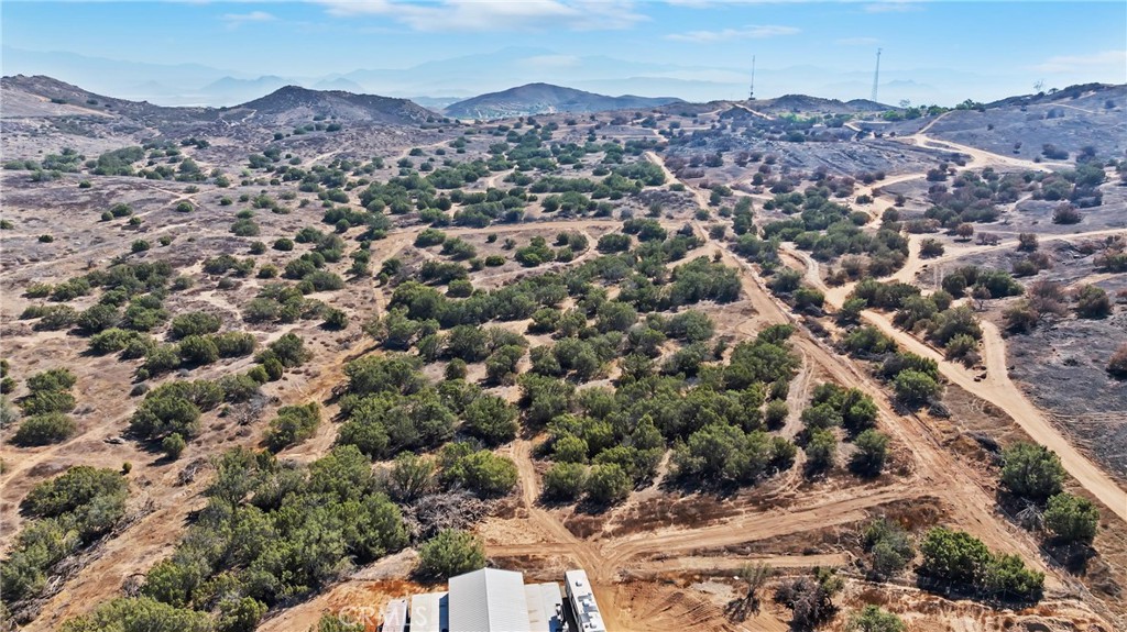 19310 Ann Way Perris, CA 92570 - Photo 55 of 75 an aerial view of residential house with a mountain in the background