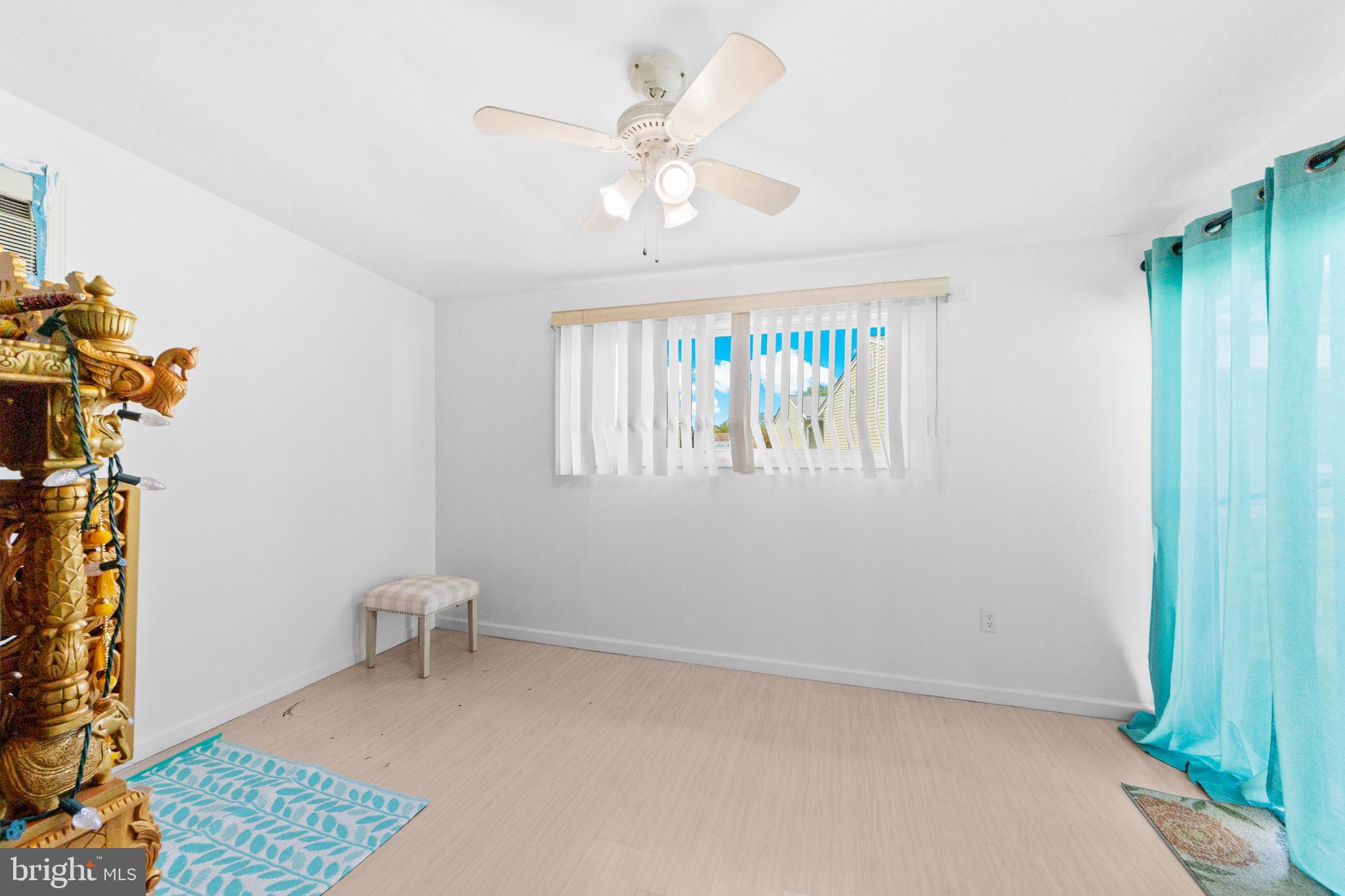 25C Pitman Road, Unit B Monroe Township, NJ 08831 - Photo 14 of 29 wooden floor in an empty room