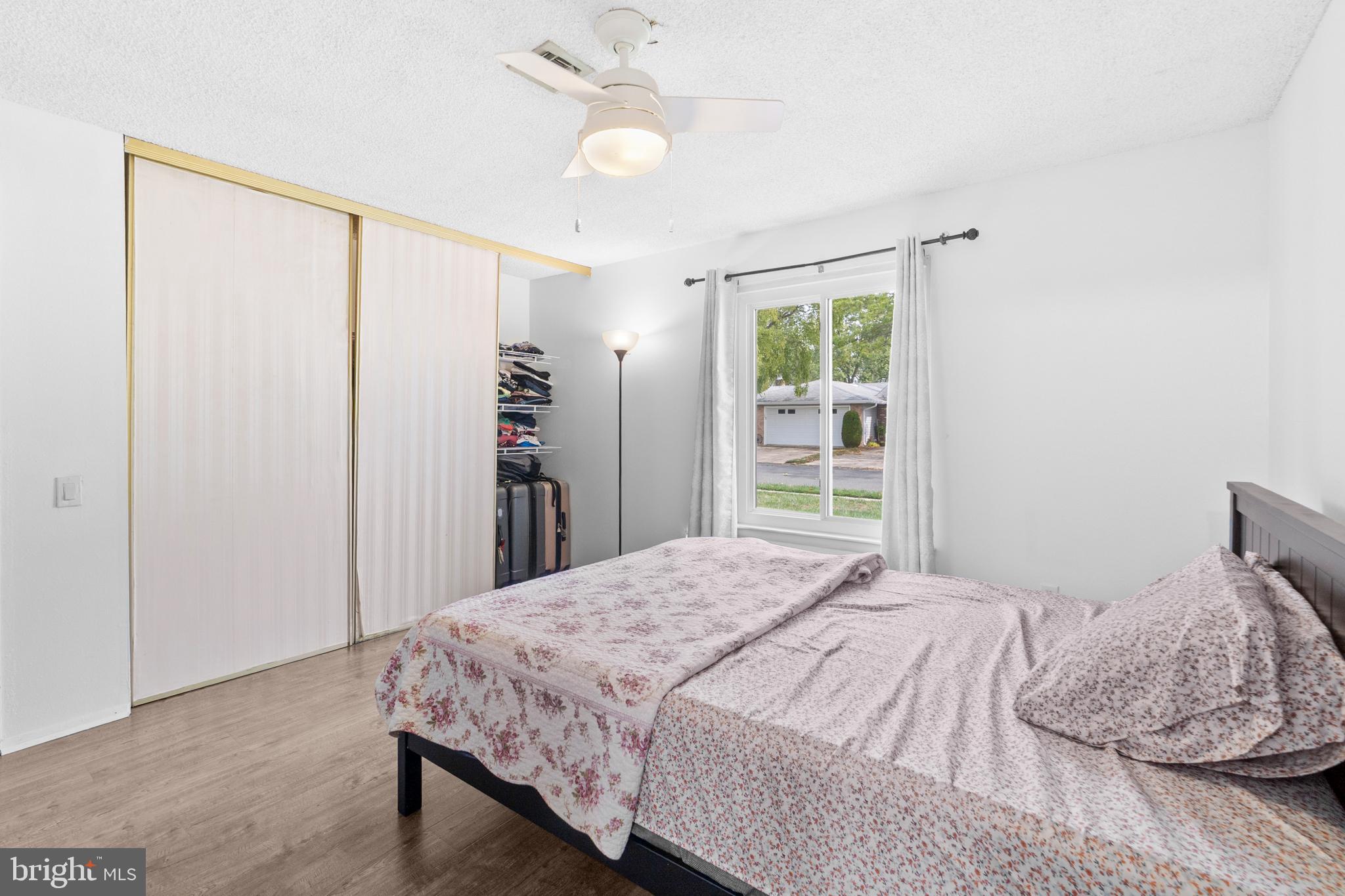 25C Pitman Road, Unit B Monroe Township, NJ 08831 - Photo 21 of 29 a bedroom with a large bed and a window